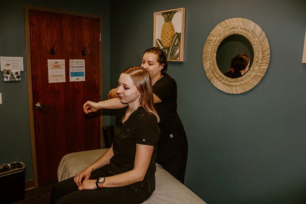 Chiropractic Maple Grove MN Ashlee Stretching Patient Neck Chiropractic Maple Grove MN Ashlee Stretching Patient Neck